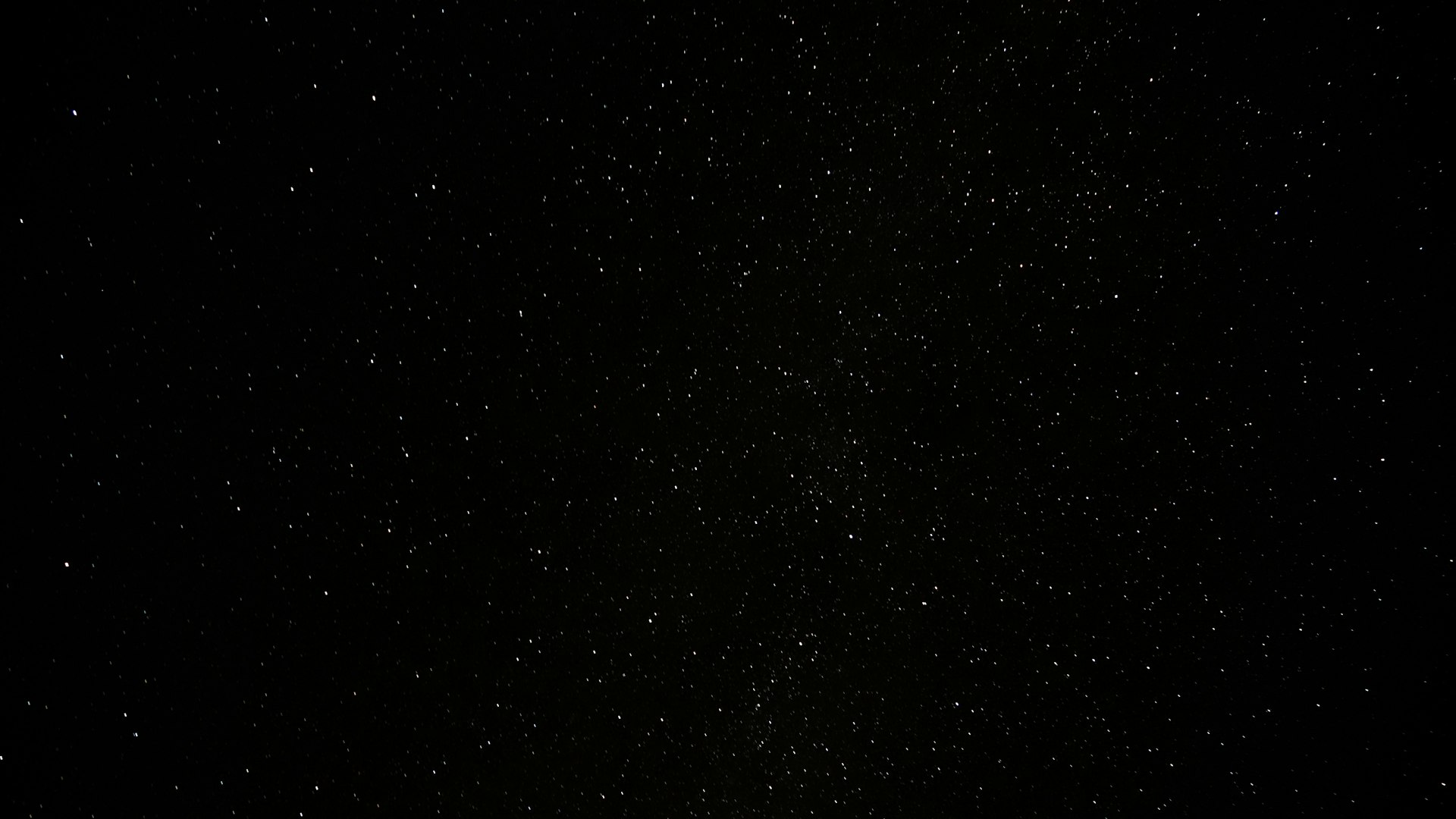 a black sky with a lot of stars